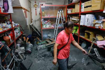 Image for Taiwan rescuers battle thick mud to look for missing from Super Typhoon Ragasa