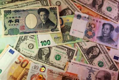 Image for Dollar treads water as Fed hike bets pared on benign US inflation