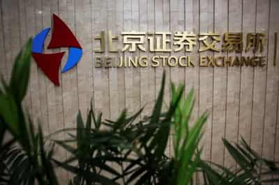 Image for Global stock index climbs while dollar falls after US inflation data