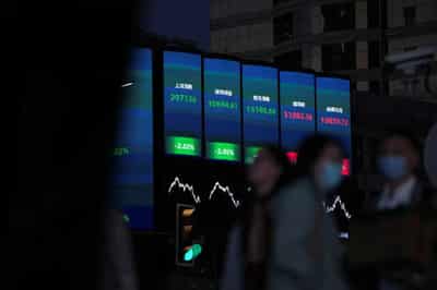 Image for Asian shares tentative, US debt ceiling talks weigh on risk appetite