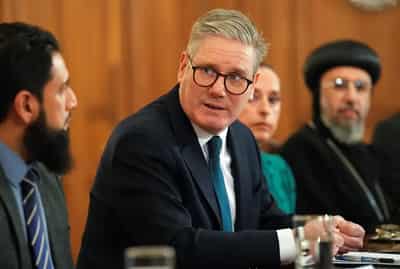 Image for While farmers protest, UK’s Starmer says will defend budget ‘all day long’