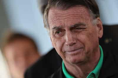 Image for Brazil's top court orders raids on Bolsonaro; Washington revokes judge's visa