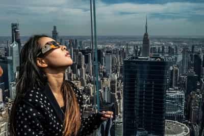 Image for Total solar eclipse: North Americans celebrate with cheers, music and matrimony