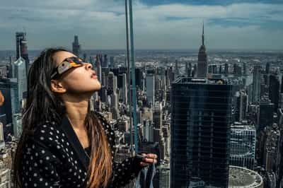 Image for Total solar eclipse: North Americans celebrate with cheers, music and matrimony