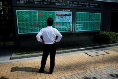 Image for Wall St flutters, Treasury yields ease as Powell resumes testimony