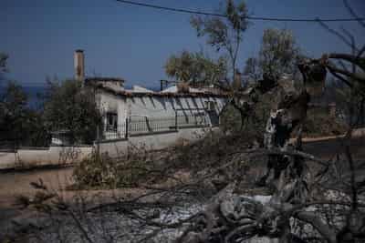 Image for Albanian firefighters battle blazes as southern and eastern Europe feels the heat