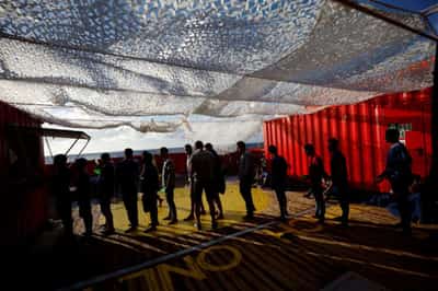 Image for After rescue by Open Arms, 99 migrants wait to dock in Europe