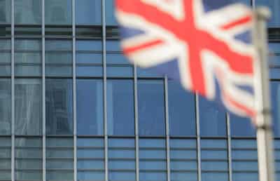 Image for FTSE 100 supported by financial, healthcare stocks; mid-caps at record highs