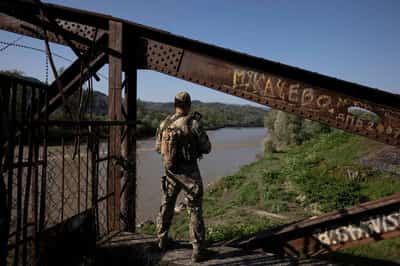 Image for Ukrainian border guards helped draft-dodgers flee country, police say