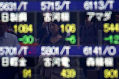 Image for Asian stocks climb as strong earnings buoy Wall Street