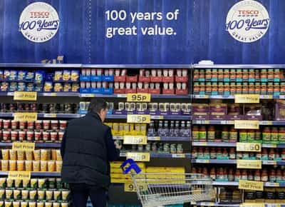 Image for From free crumpets to store discounts, UK grocers lure workers
