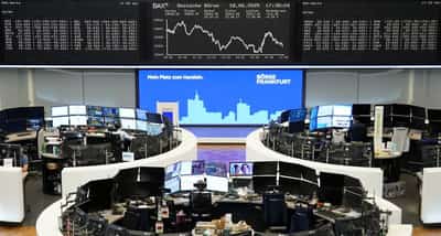 Image for European shares end marginally lower as markets gauge trade talks, US tax bill