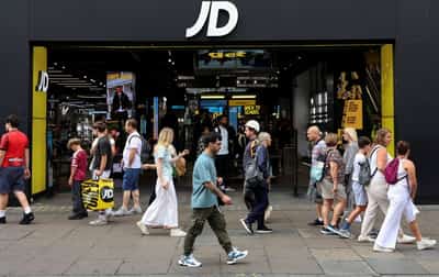 Image for Britain's JD Sports cuts profit outlook as U.S. sales slump