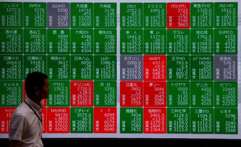 Image for Asian markets dip as investors weigh tech earnings, Gulf tensions