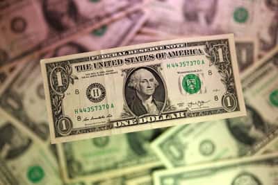 Image for Dollar suddenly falls against yen, traders on alert for further intervention