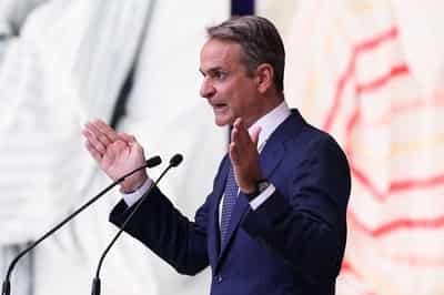 Image for Greek premier rules out snap election, says tax cuts will help families
