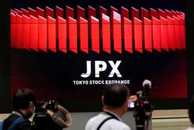 Image for Asian shares fall as China drags, dollar in demand