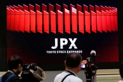 Image for Asian shares fall as China drags, dollar in demand