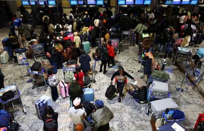 Image for African migrants flee into the mountains as South Africa's xenophobic violence surges
