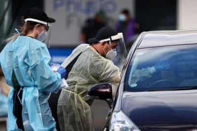 Image for New Zealand&#8217;s COVID cases jump as its battles Delta variant