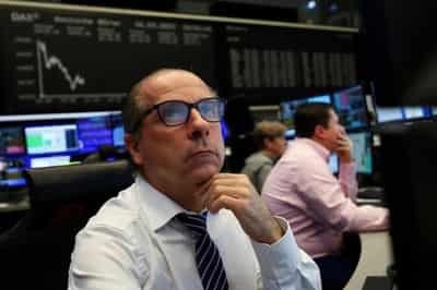 Image for Stocks falter as economic worries nag, NZ delivers big rate hike