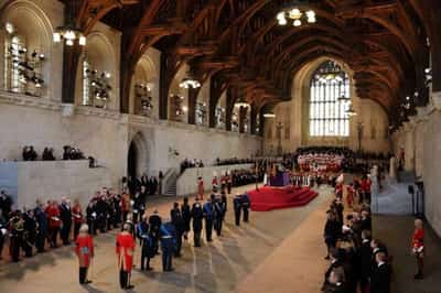 Image for King Charles, William and Harry reunited in grief to escort queen’s coffin
