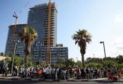 Image for Relieved foreigners leave a tense Israel after truce with Iran