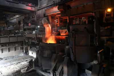 Image for German industrial output rises, exports unexpectedly up in April