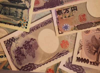 Image for Yen trims gains as possible next BOJ governor says current policy appropriate