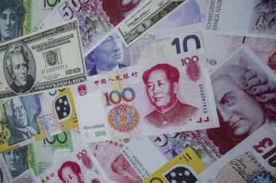 Image for Dollar gains after Fitch watch heightens debt ceiling jitters