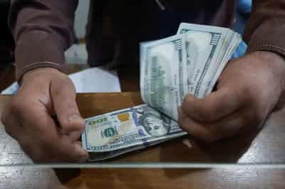 Image for Dollar rebounds on hot US import prices