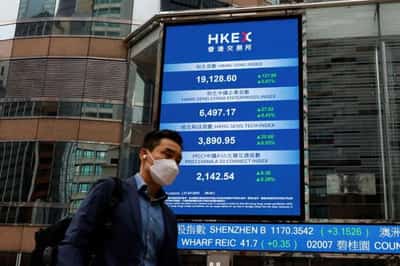 Image for Stocks gain, gold jumps as Fed rate hike pause seen