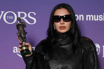 Image for U2, Charli XCX and Robbie Williams honoured at Ivor songwriting awards