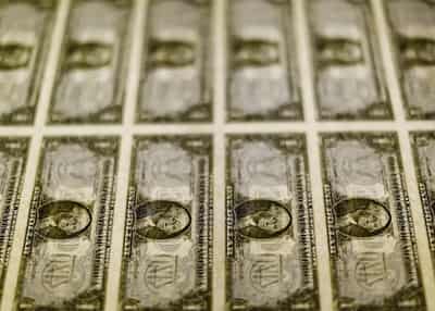Image for Dollar up as traders await Fed clues; sterling rises