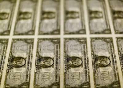 Image for Dollar up as traders await Fed clues; sterling rises