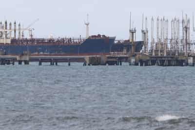 Image for Oil prices settle higher, then reverse gains after Trump eases worries about Iran