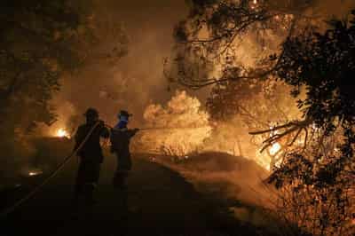Image for Greece arrests Georgian suspected of fuelling Chios fire with cigarette