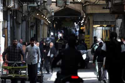 Image for War hits Tehran’s grand bazaar as prices surge and shops shut