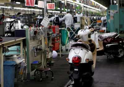 Image for Japan manufacturers&#8217; mood hits two-year high on chip demand: Reuters Tankan