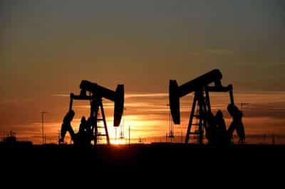 Image for Oil prices hit 10-month high as Saudi, Russia extend supply cuts