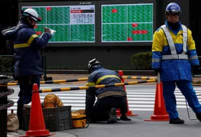 Image for Asian stocks slide as Iran war keeps oil near $100, dents rate-cut bets