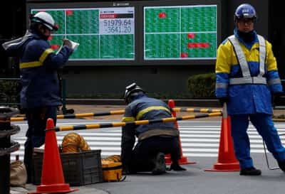 Image for Asian stocks slide as Iran war keeps oil near $100, dents rate-cut bets