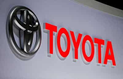 Image for Toyota cuts output target amid chip crunch as profit tumbles 25%