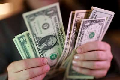 Image for Dollar holds firm as Middle East hostilities lift oil 