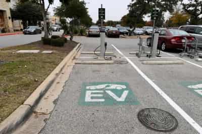 Image for Biden&#8217;s EV charging push boosts established automakers taking on Tesla