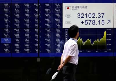 Image for World stocks rise on rate cut bets, yen flounders at 38-year lows