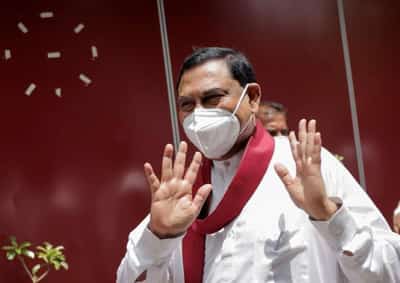 Image for Seething Sri Lanka stops president’s brother flying out of the country