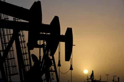 Image for Oil prices ease to trade near 2-month lows on China demand fears, dollar strength