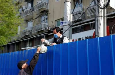 Image for ‘Entry only. No exit:’ Beijing sees more COVID closures as anger grows in Shanghai