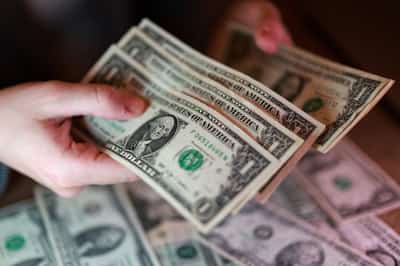 Image for Dollar firms as oil climbs, bond rout saps risk appetite